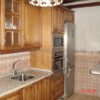 Muebles de cocina de madera rústica - Imagen 11