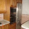 Muebles de cocina de madera rústica - Imagen 4