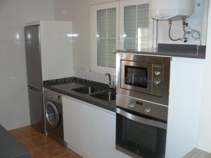 Muebles de cocina con isla y tirador gola - Imagen 6