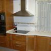 Muebles de cocina enmarcada en madera de haya tintada